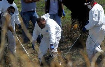 Hallan 16 cuerpos en fosas clandestinas de Jacona, Michoacán