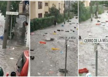 Torrente de agua arrastra a tianguis y vendedores en Tlalnepantla